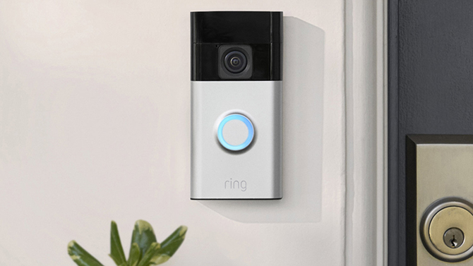 Ring Battery Doorbell shown installed by a door.